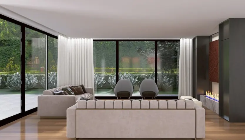 Modern living room with two beige sofas, two grey chairs, and a linear fireplace overlooking a lush green garden.