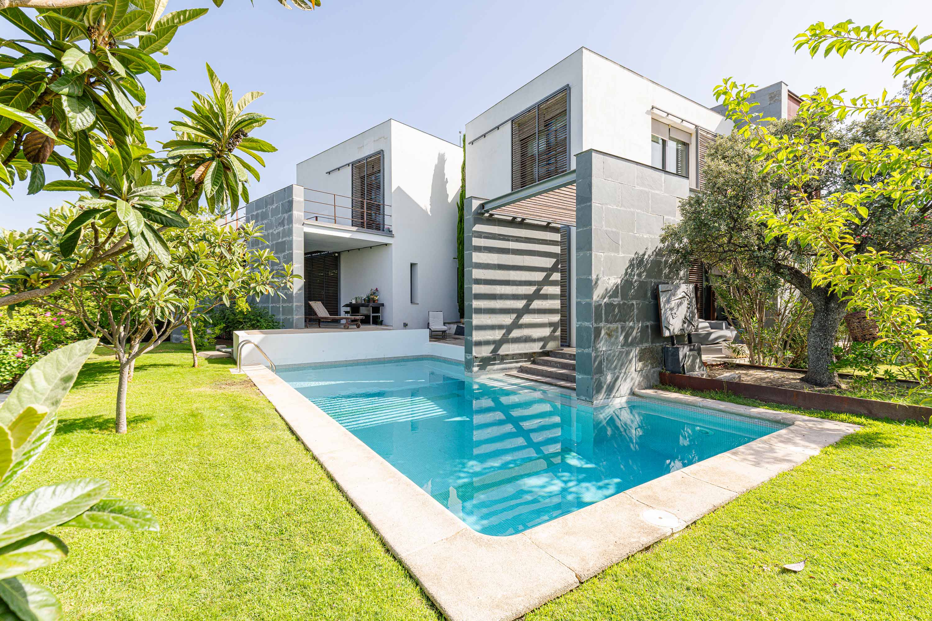 Contemporary architecture with designer garden and infinity pool