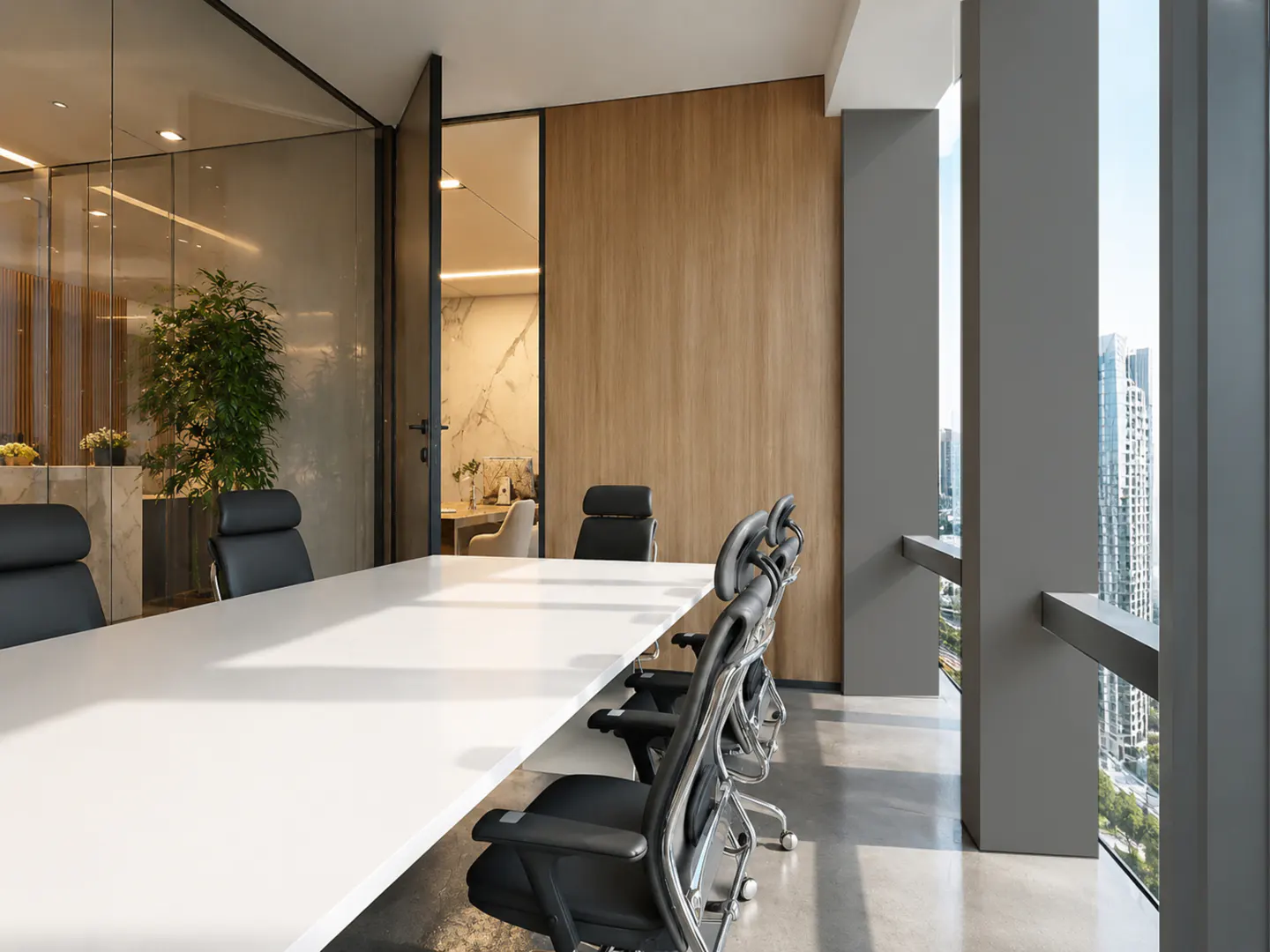 Modern conference room with a long white table, black office chairs, wood paneling, and floor-to-ceiling city views.