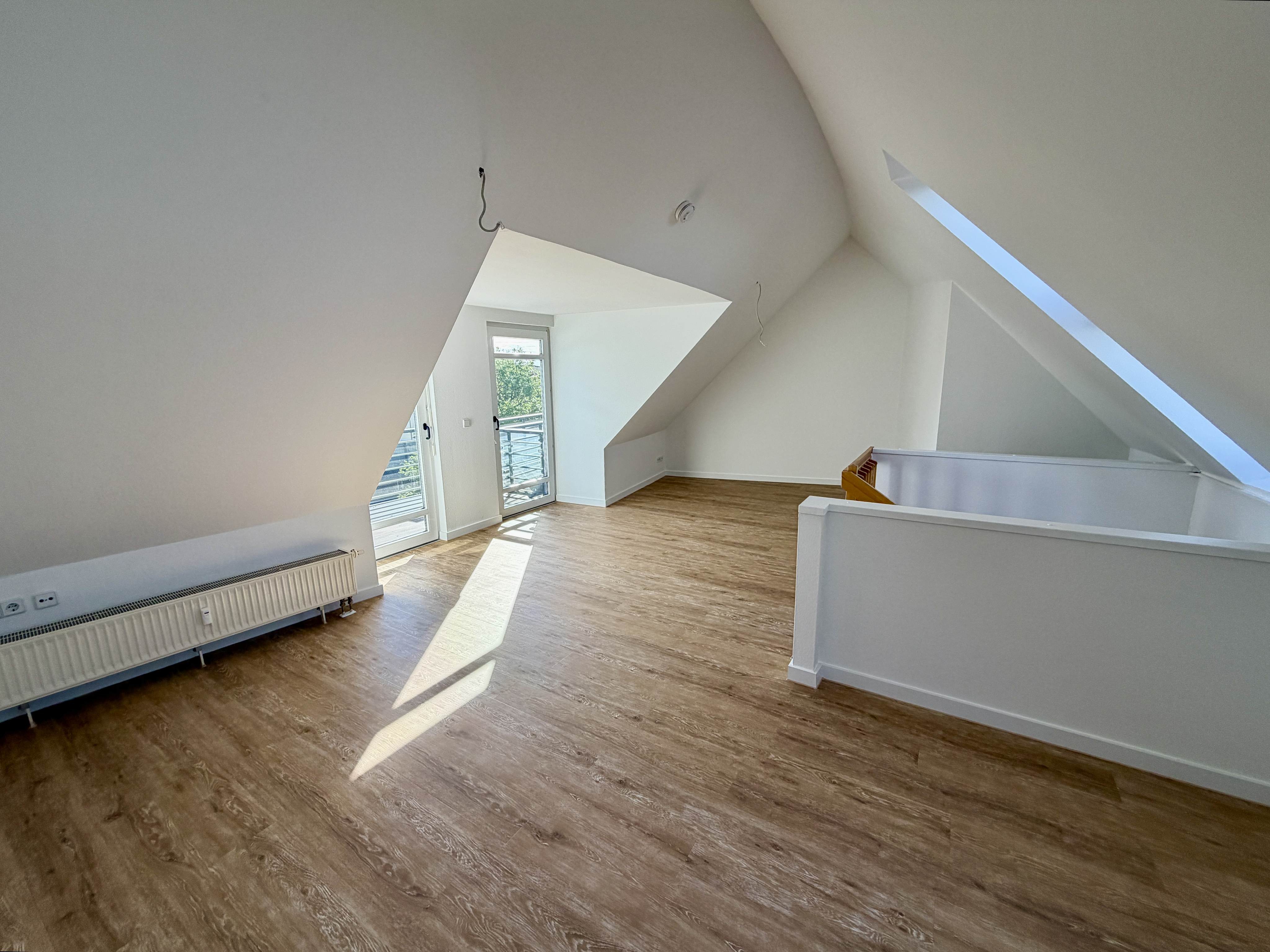 Lichtdurchflutete Maisonette-Dachgeschosswohnung mit Balkon in Magdeburg-Ottersleben