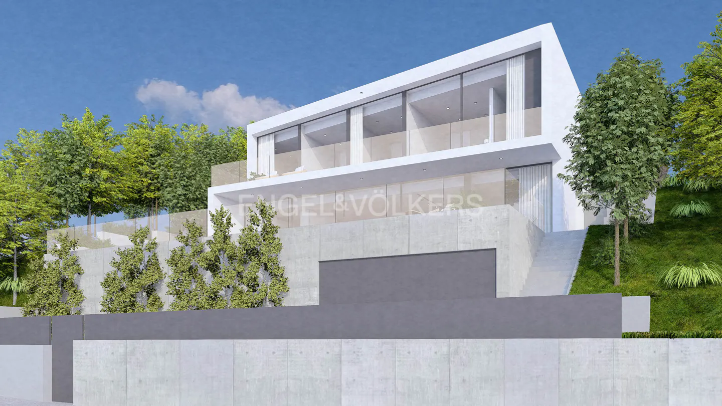Modern white house with large windows and concrete walls, surrounded by green trees and blue sky.