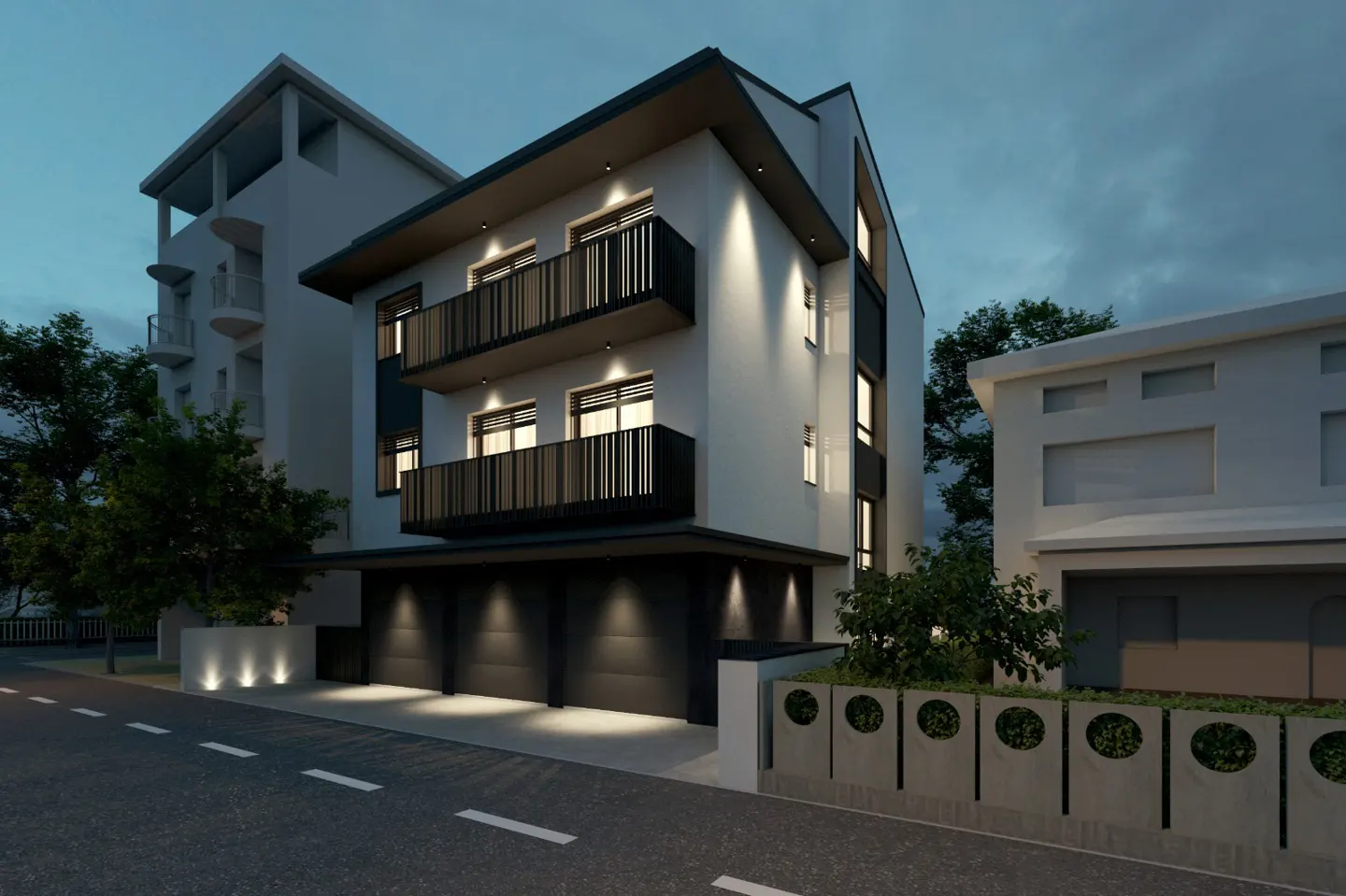 Modern three-story white building with black balconies and garage doors at dusk.