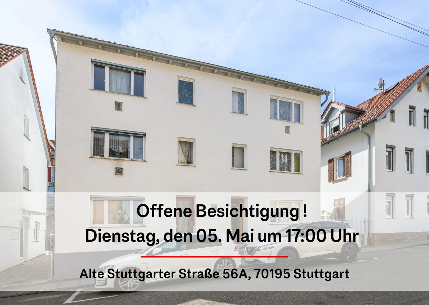 White three-story apartment building with an open house announcement. Two white cars are parked in front.