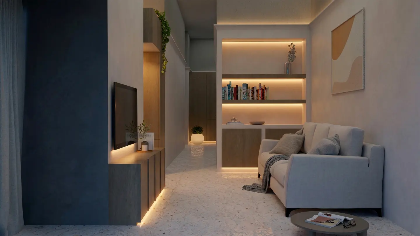 A modern living room with a gray sofa, TV, and built-in shelves with warm lighting. An abstract art piece hangs on the wall.