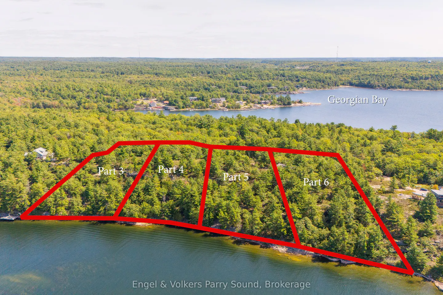Aerial view of waterfront land parcels marked in red, labeled "Part 3" to "Part 6," on a wooded shoreline along Georgian Bay.