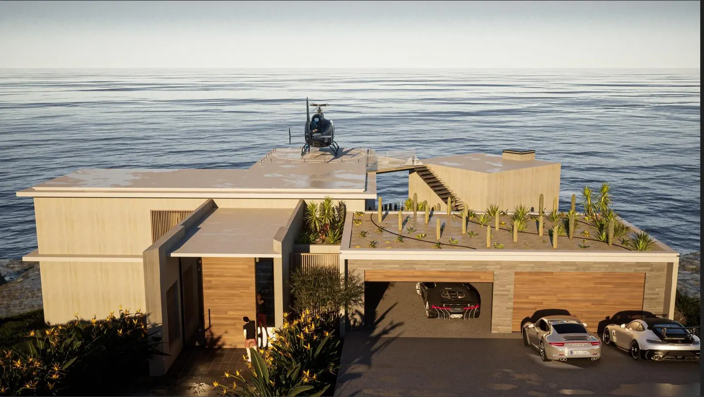 Luxury oceanfront home with a helicopter pad, garage with exotic cars, and lush landscaping.