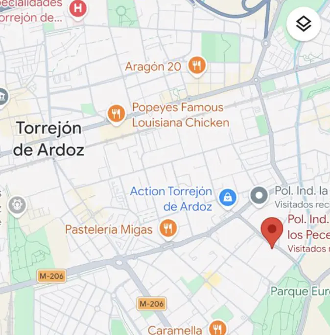 A map of Torrejón de Ardoz, Spain, shows streets, restaurants, and industrial parks. A red pin marks a location near Parque Europa.