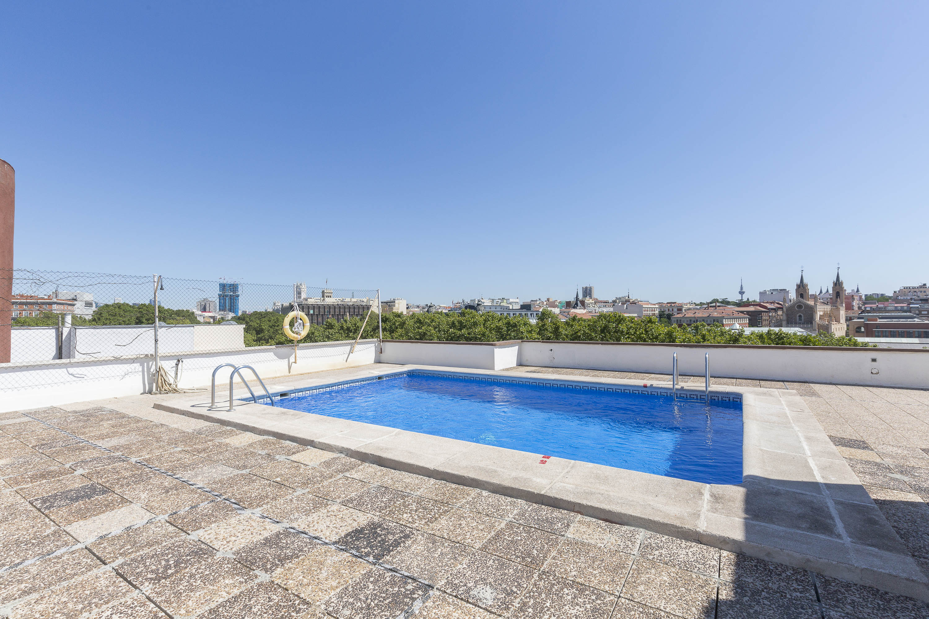 Exterior one bedroom apartment with terrace, parking and pool on Paseo del Prado for rent.