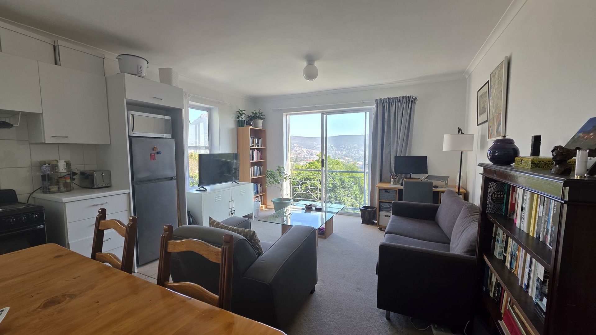 Bright corner apartment with stunning views & covered parking