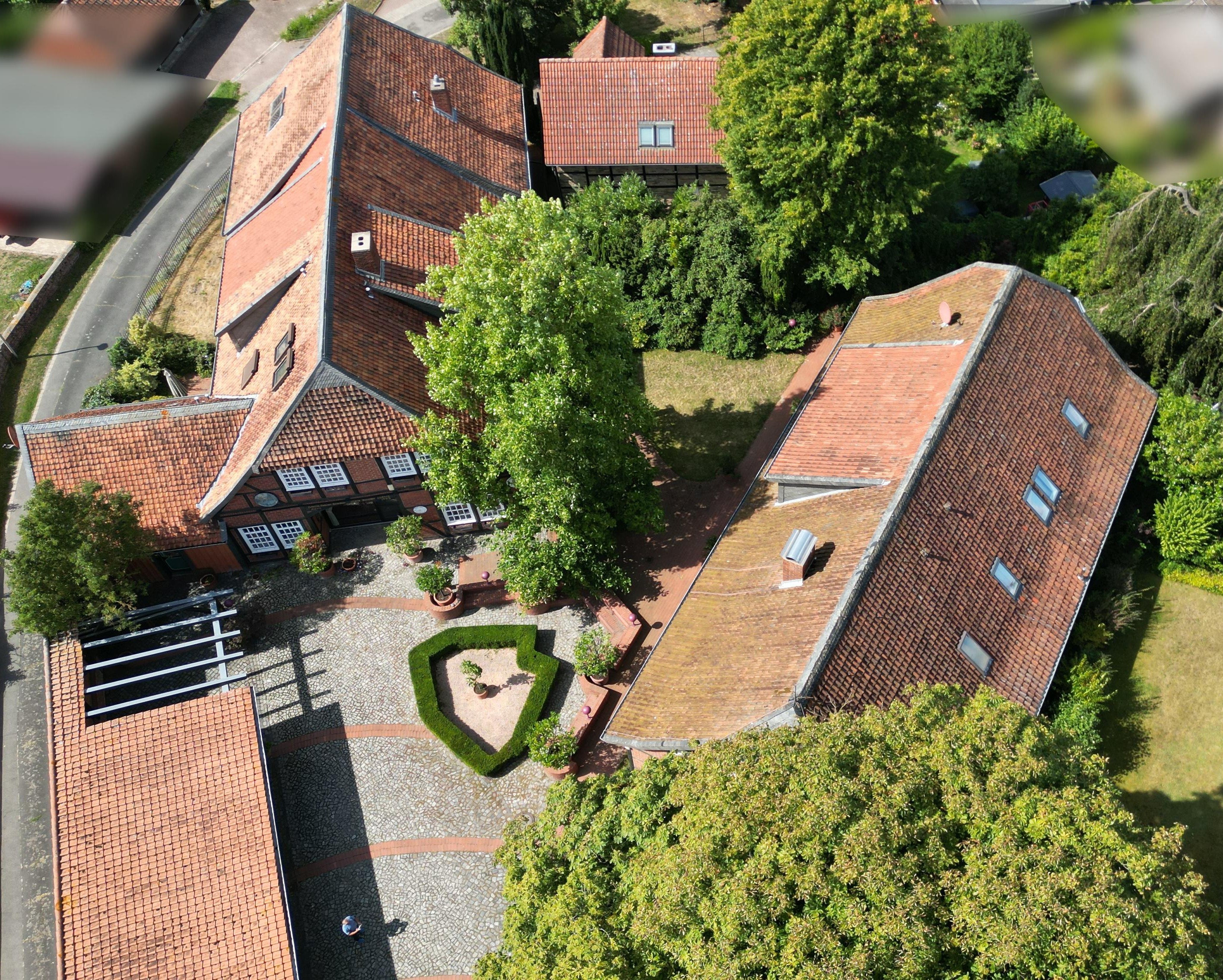 Unique estate with two Lower Saxony houses in an idyllic, spacious garden