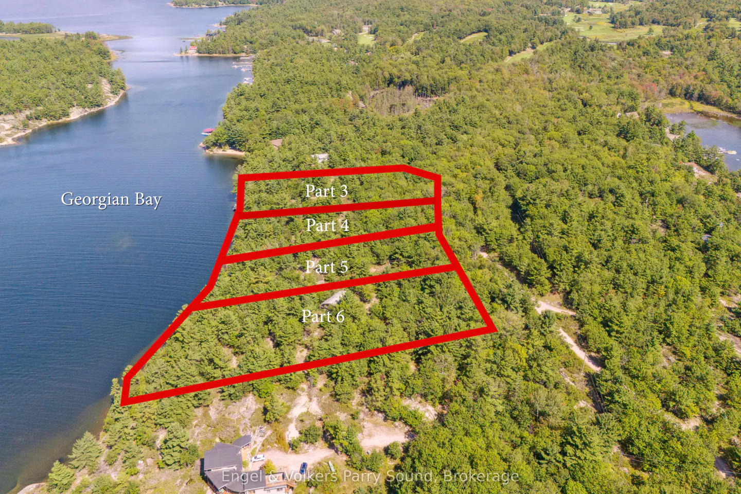 Aerial view of wooded land parcels on Georgian Bay, outlined in red, labeled "Part 3" to "Part 6".