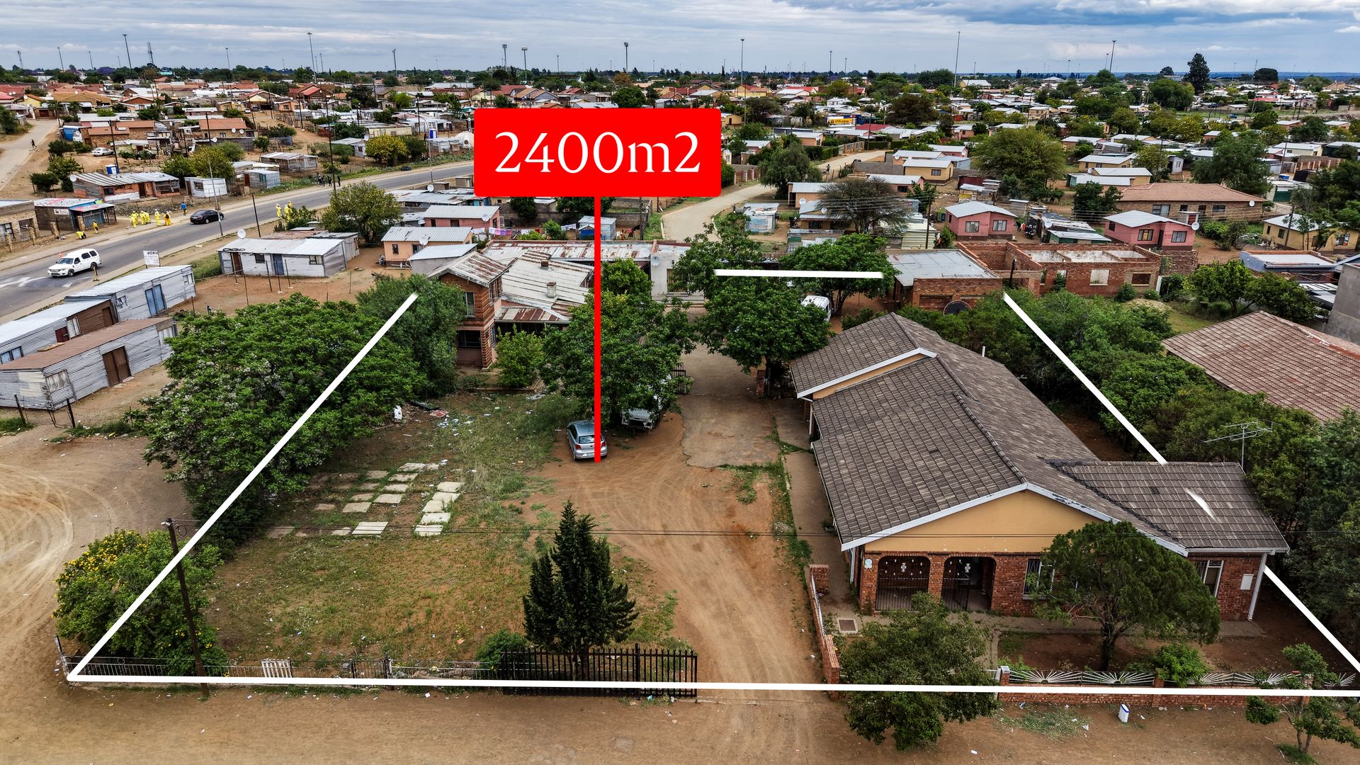 Four Full-Title Properties on Lynch Street: Two Homes and Two Stands