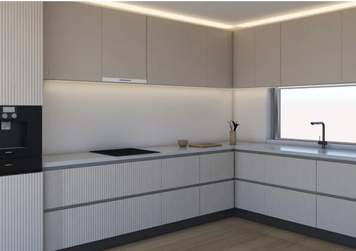 A modern kitchen with gray cabinets, white countertops, and a black oven. A window is above the sink.