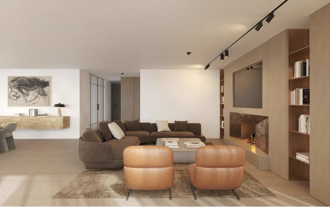 A modern living room with brown sectional sofa, two leather chairs, and a fireplace with a TV above it.