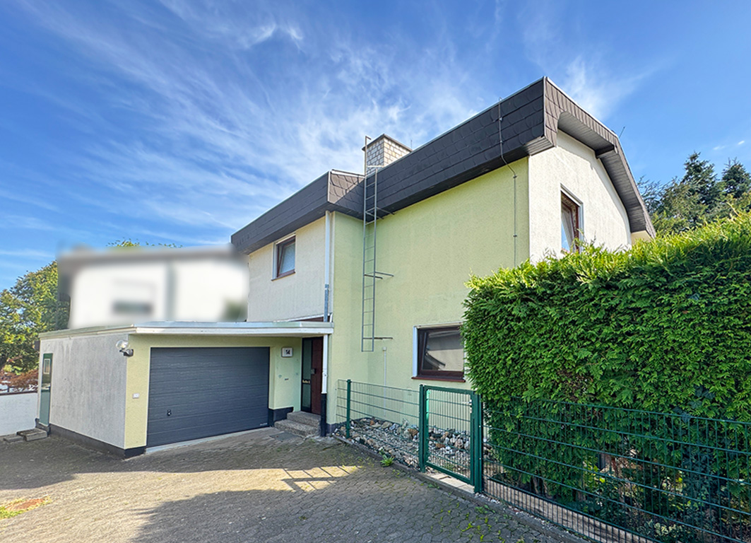 Sanierungsbedürftiges Einfamilienhaus in bester Lage
