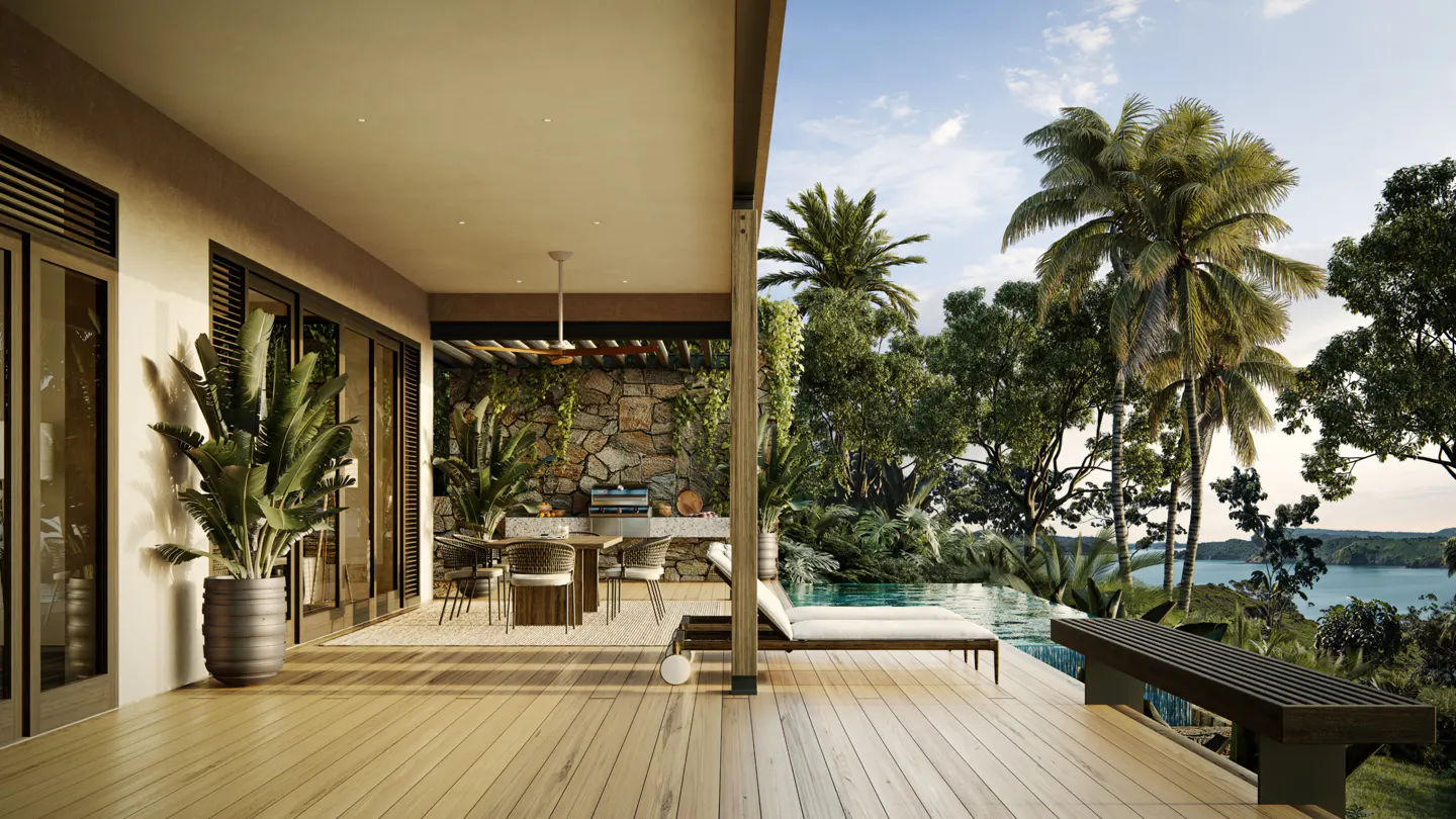 Outdoor patio with wood deck, dining table, lounge chairs, and ocean view with palm trees.