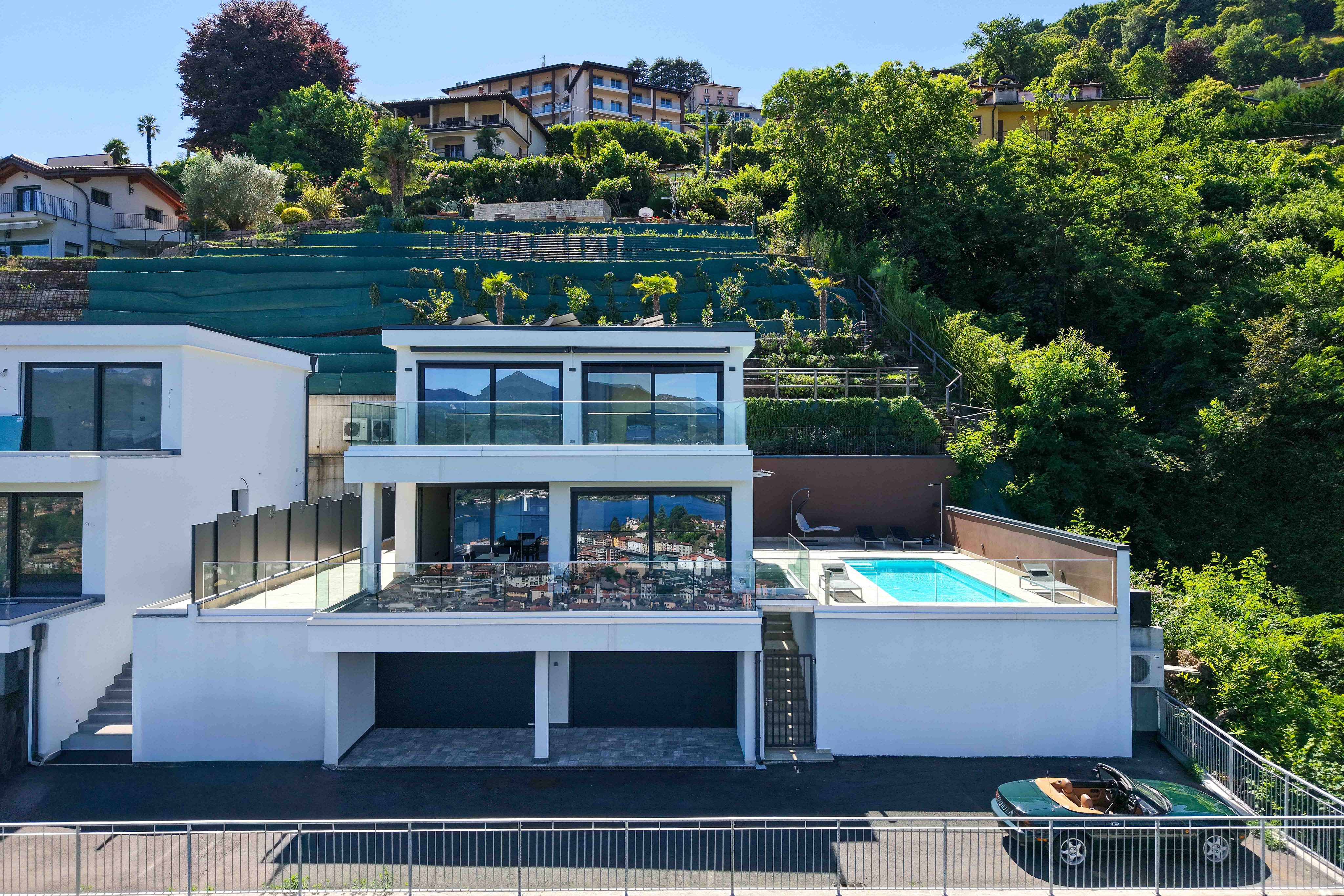 Next-generation villa with panoramic pool and commanding lake view