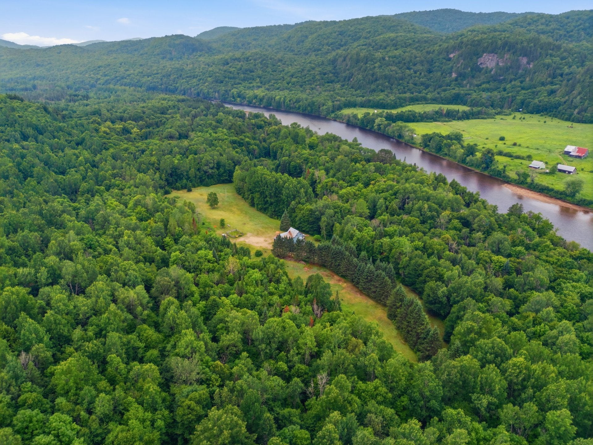 Nestled in the heart of wooded acres