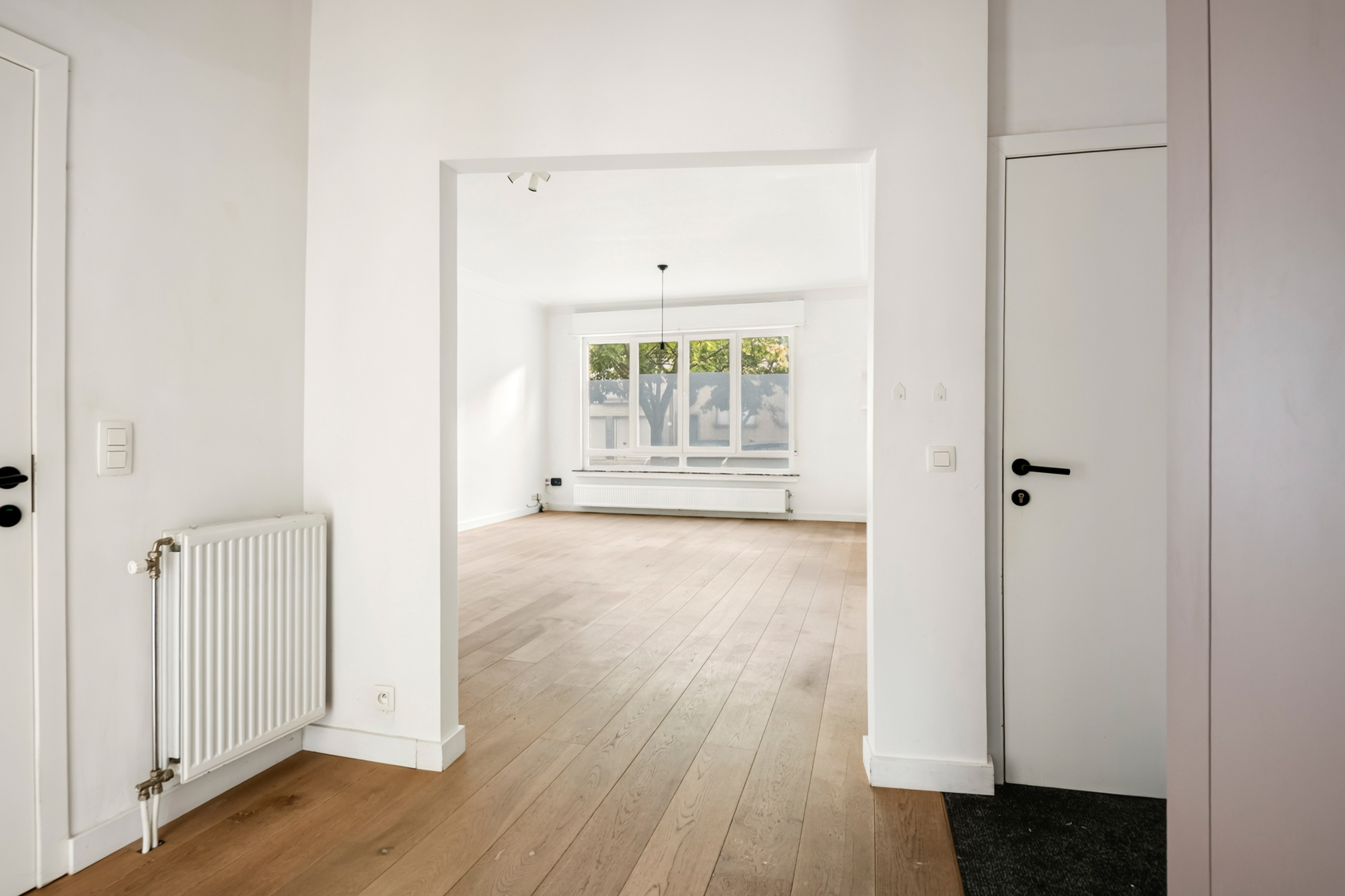 Hippe Tentoontstellingswijk: Gelijkvloers-appartement met tuin