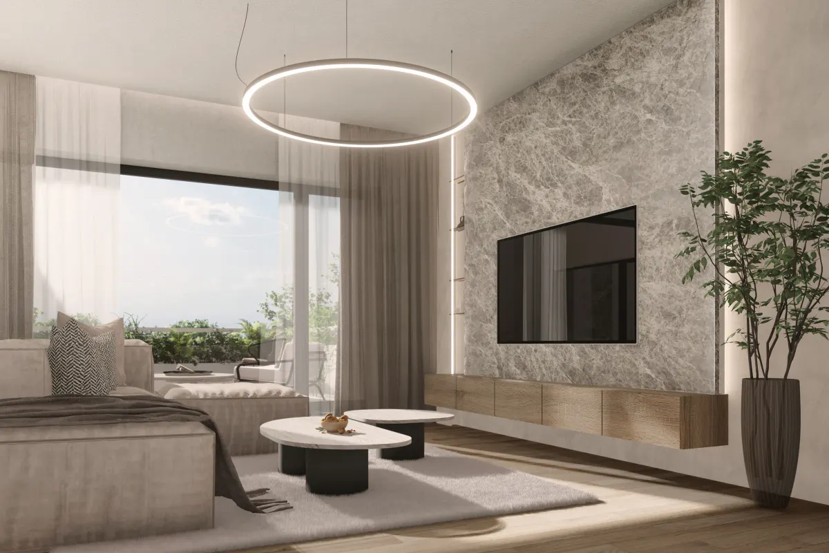 Living room with a large window, beige sofa, marble wall with a TV, and a round light fixture.