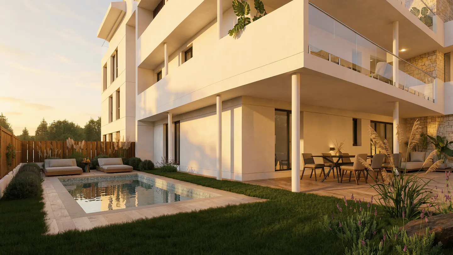 Exterior view of a modern white building with a pool, lounge chairs, and an outdoor dining area.