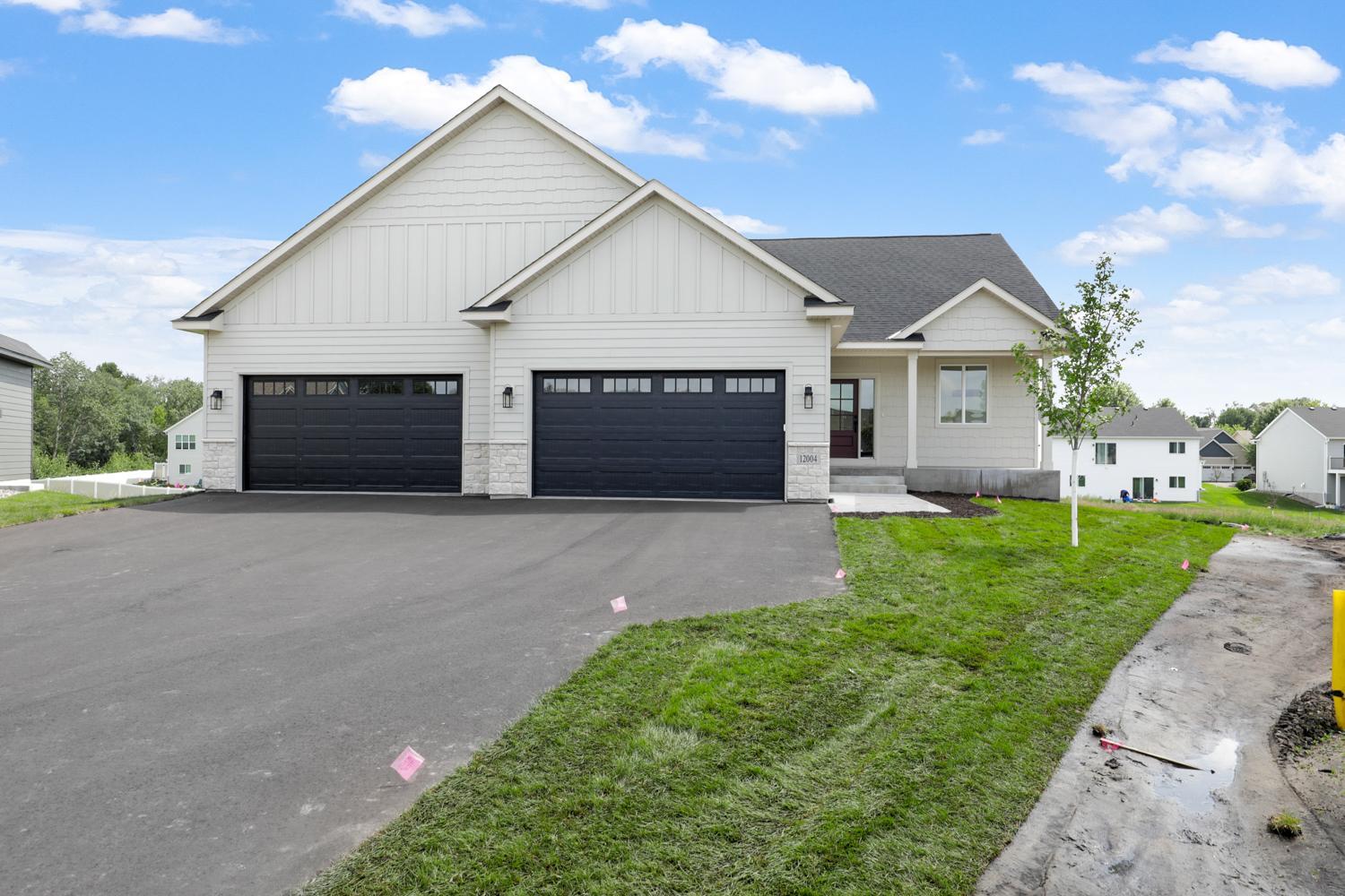 "The James" by NR Properties: Custom 4-Car Home