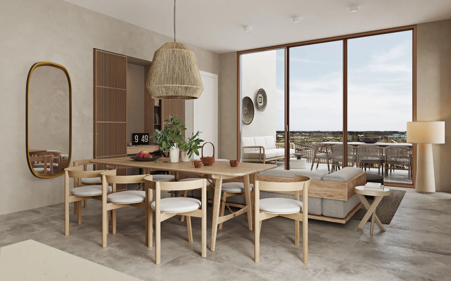 Open-concept living space with a dining table, chairs, and a jute pendant light. Sliding glass doors lead to an outdoor patio with seating.