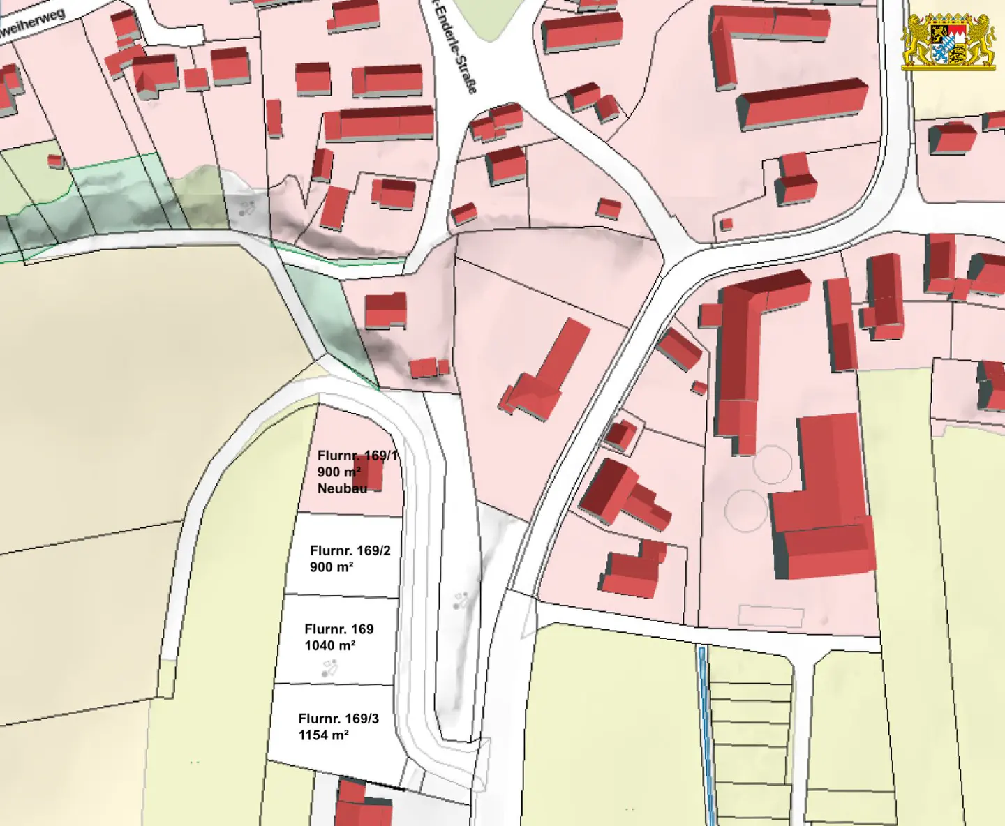 Real estate map showing plots of land with building outlines in red. Plot sizes are labeled.