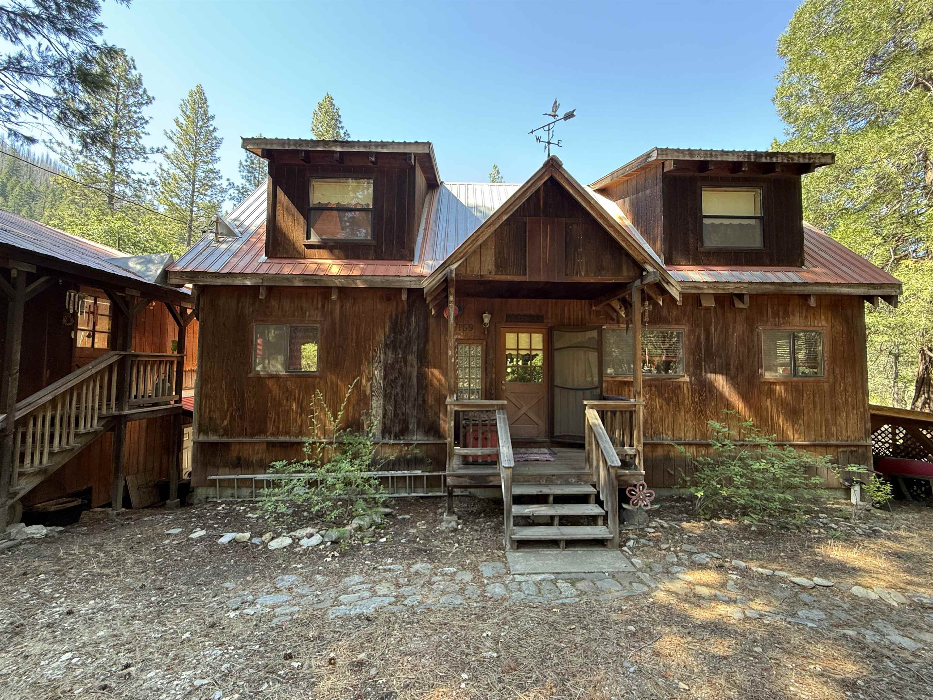 Riverfront Serenity on Two Private Acres.