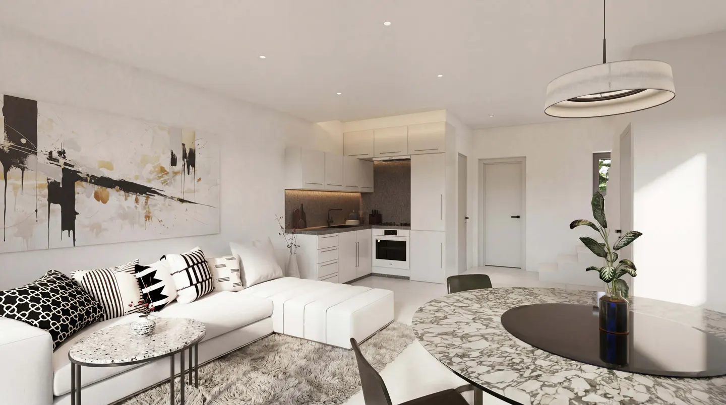Bright, modern apartment interior with white walls, a white sofa with patterned pillows, and a marble-topped dining table. Abstract art hangs above the sofa.