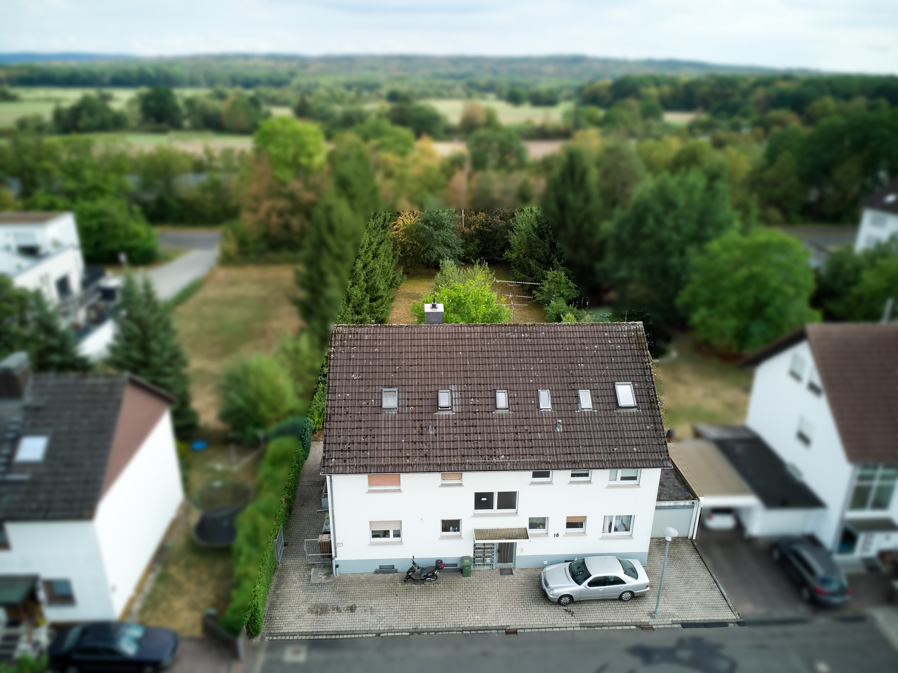 Mehrfamilienhaus mit Entwicklungspotential und Baugrundstück in Langenselbold