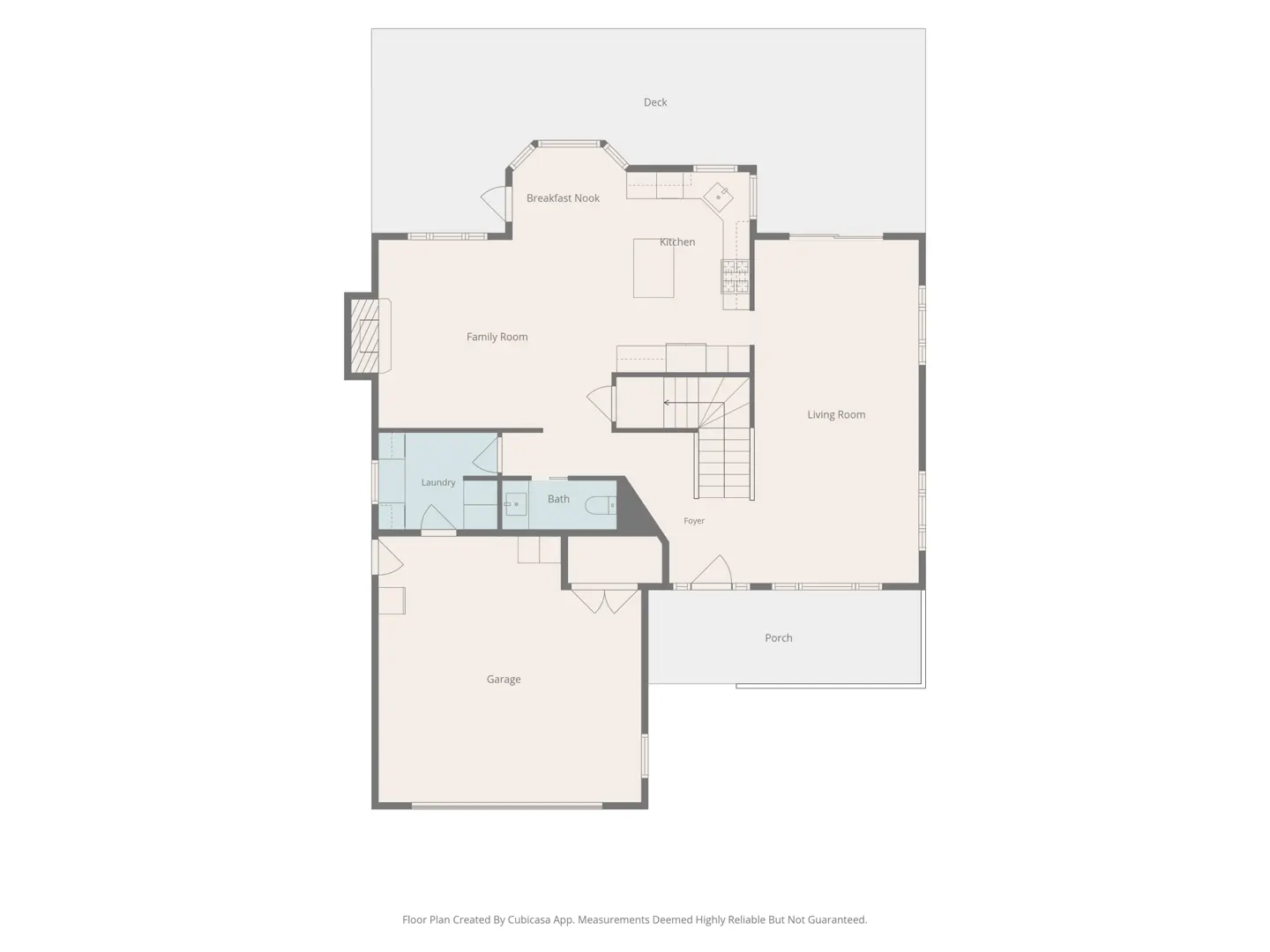 2D floor plan of a home's main level, showing a garage, living room, kitchen, family room, laundry, and rear deck.