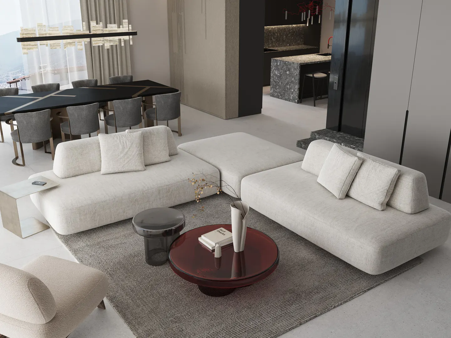 Modern living room with a modular white sofa, a red coffee table, and a dining table with gray chairs.