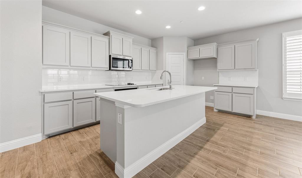 Designer Elegance: Townhome with Sophisticated Upgrades