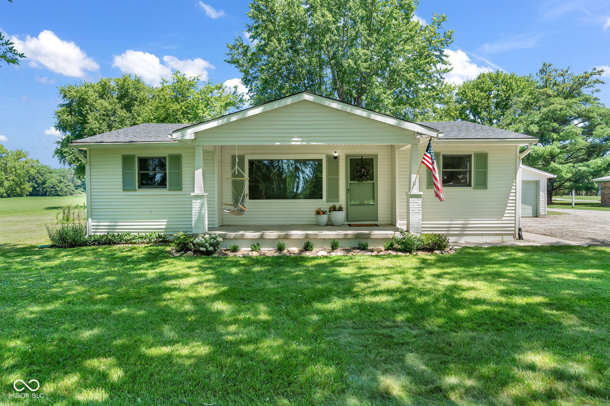 Updated Ranch on 10.27 Acres with Barns & Outbuildings