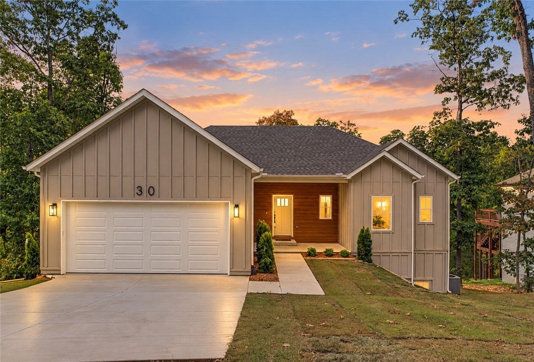 Walk-out with 2 living rooms in Bentonville Schools