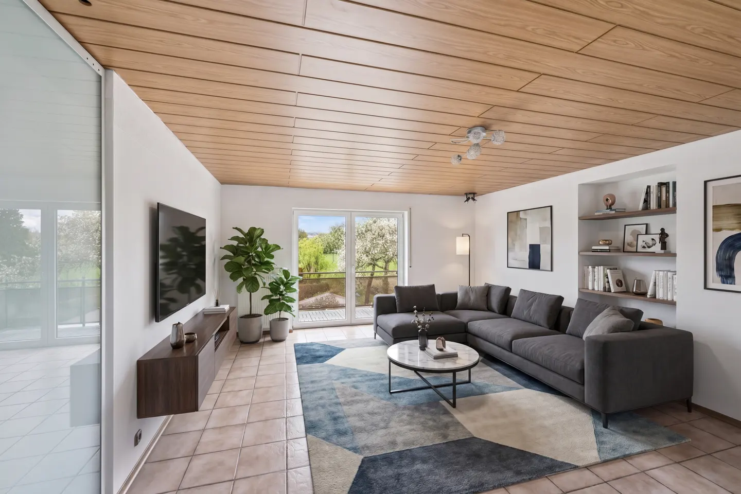 A modern living room with a gray sectional sofa, geometric rug, and wood-paneled ceiling. A TV and plants are on the left.