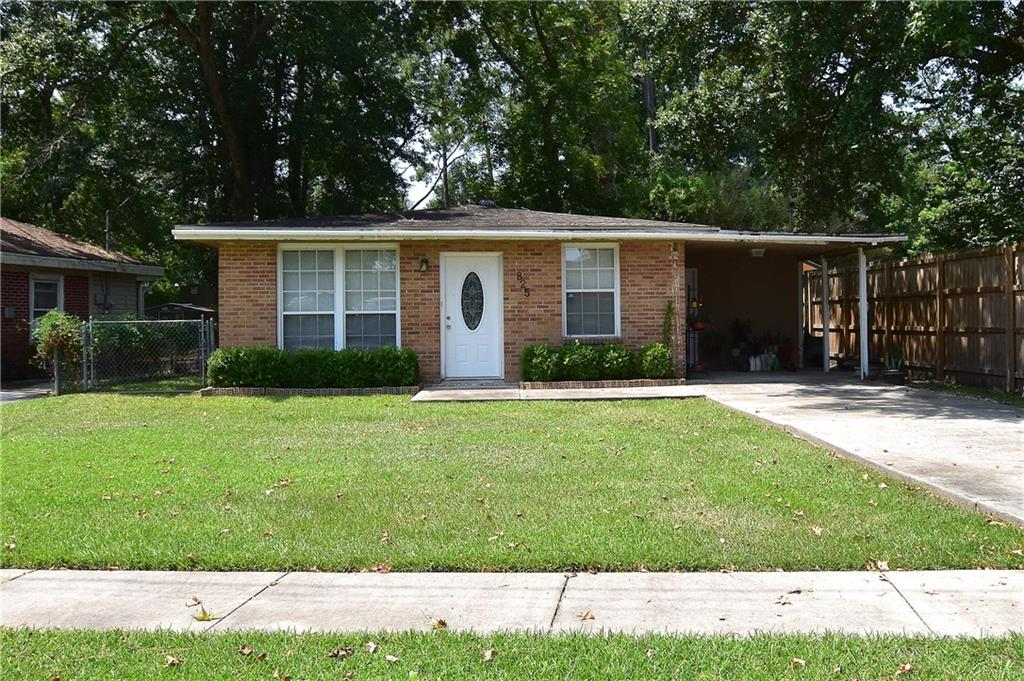 Brick Beauty Featuring a Large Backyard & NO Carpet