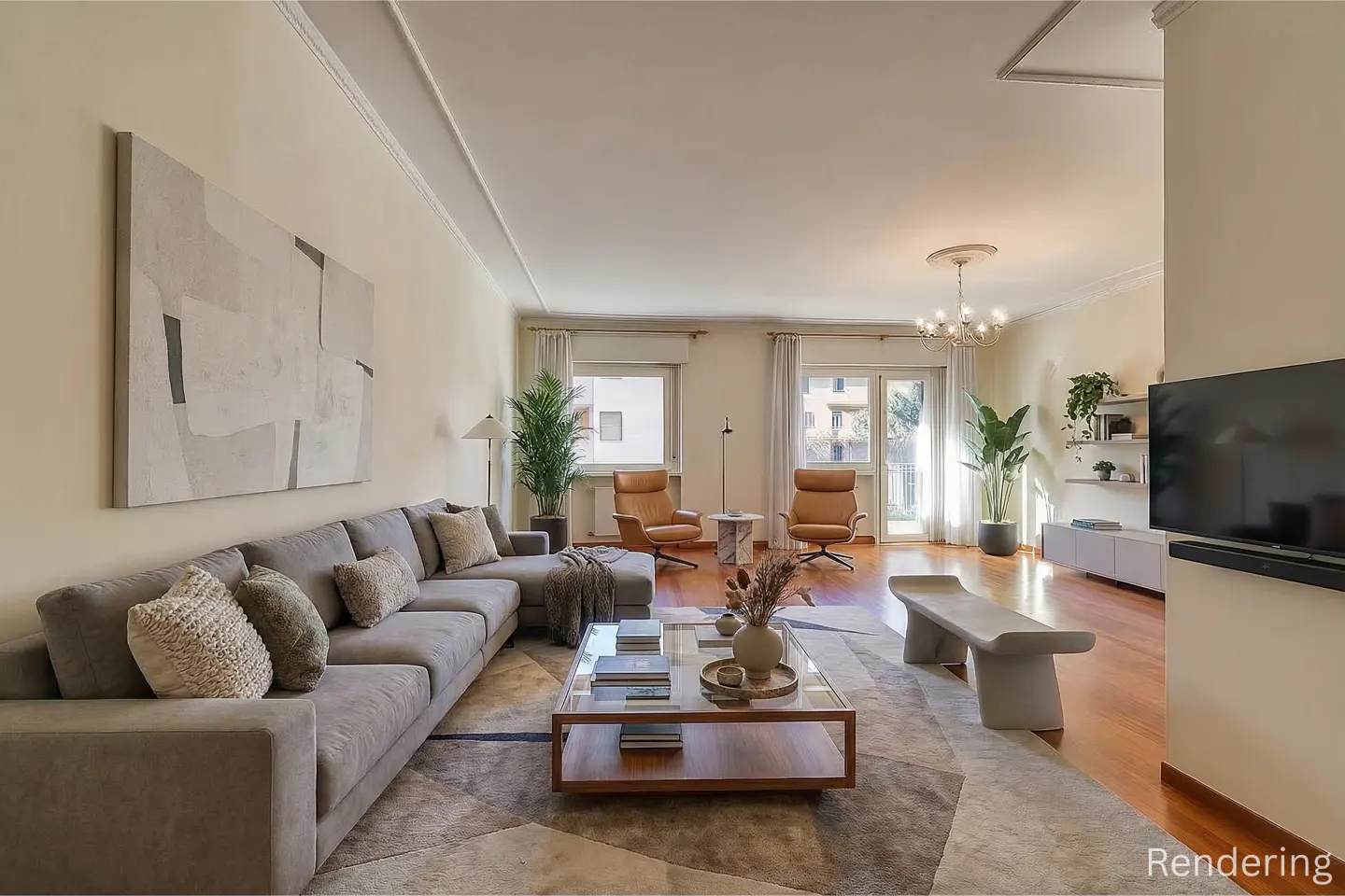 Living room with a gray sectional sofa, tan leather chairs, wood floors, and a large abstract painting.