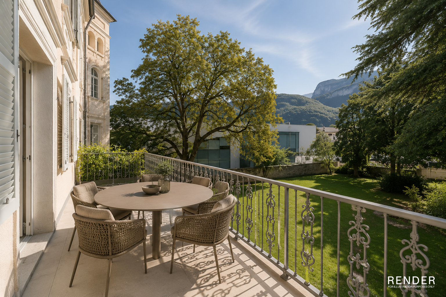 A balcony with a round table and woven chairs overlooking a lush green garden, large trees, and distant mountains.