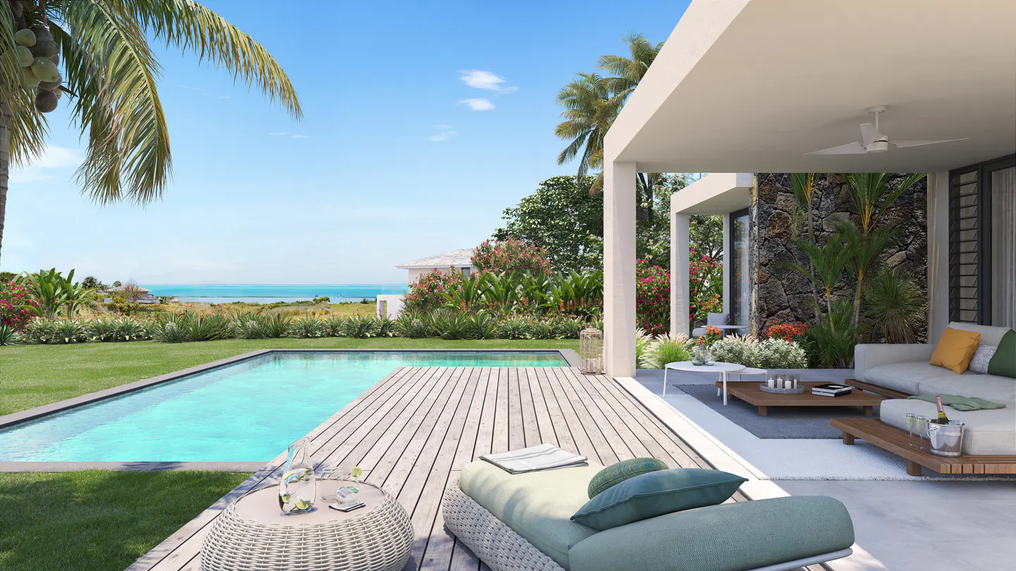 Luxury villa with a pool and ocean view. Lounge chairs sit on a wooden deck, with a modern white sofa on the patio.