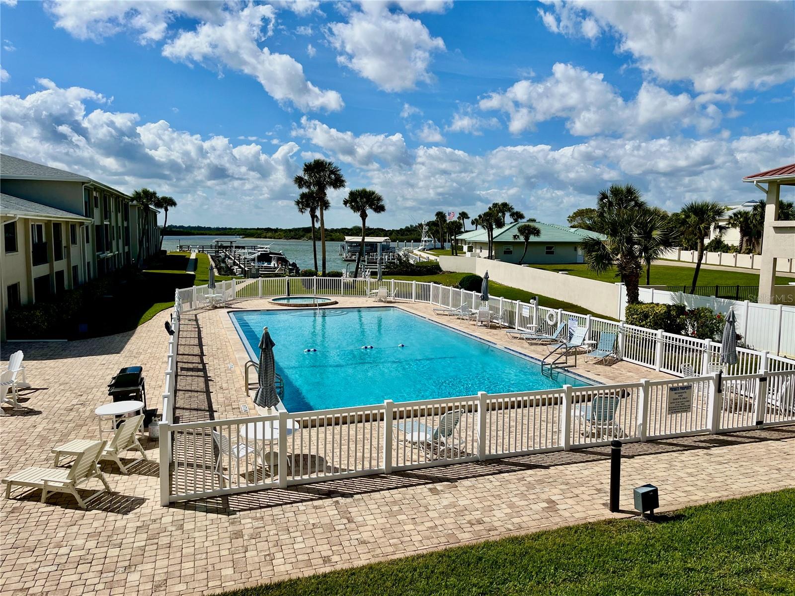 Turnkey Waterfront Oasis with Deeded Deep Water Dock