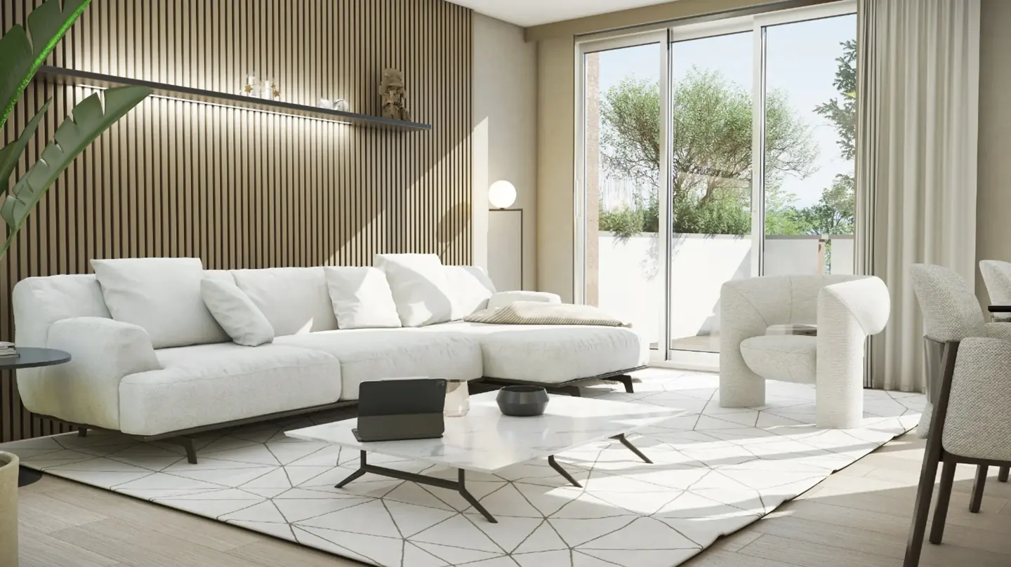 Bright living room with a white sectional sofa, marble coffee table, and a large window overlooking greenery.