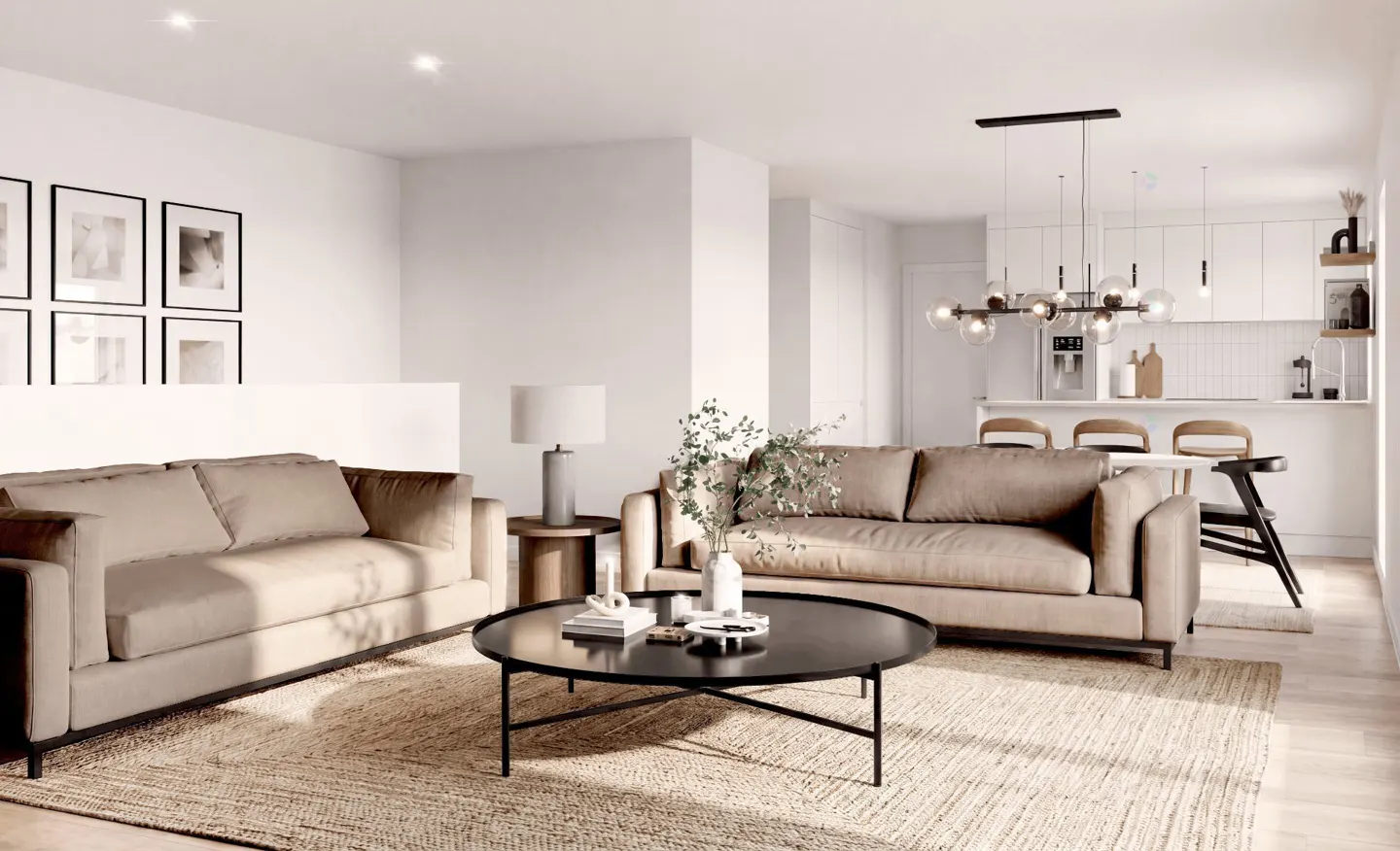 Bright living room with beige sofas, a black coffee table, and a jute rug. White kitchen in the background.