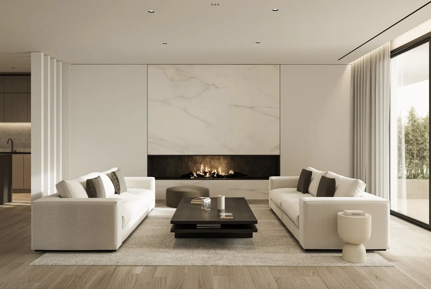 Living room with two white sofas, a dark coffee table, and a fireplace with a marble surround.