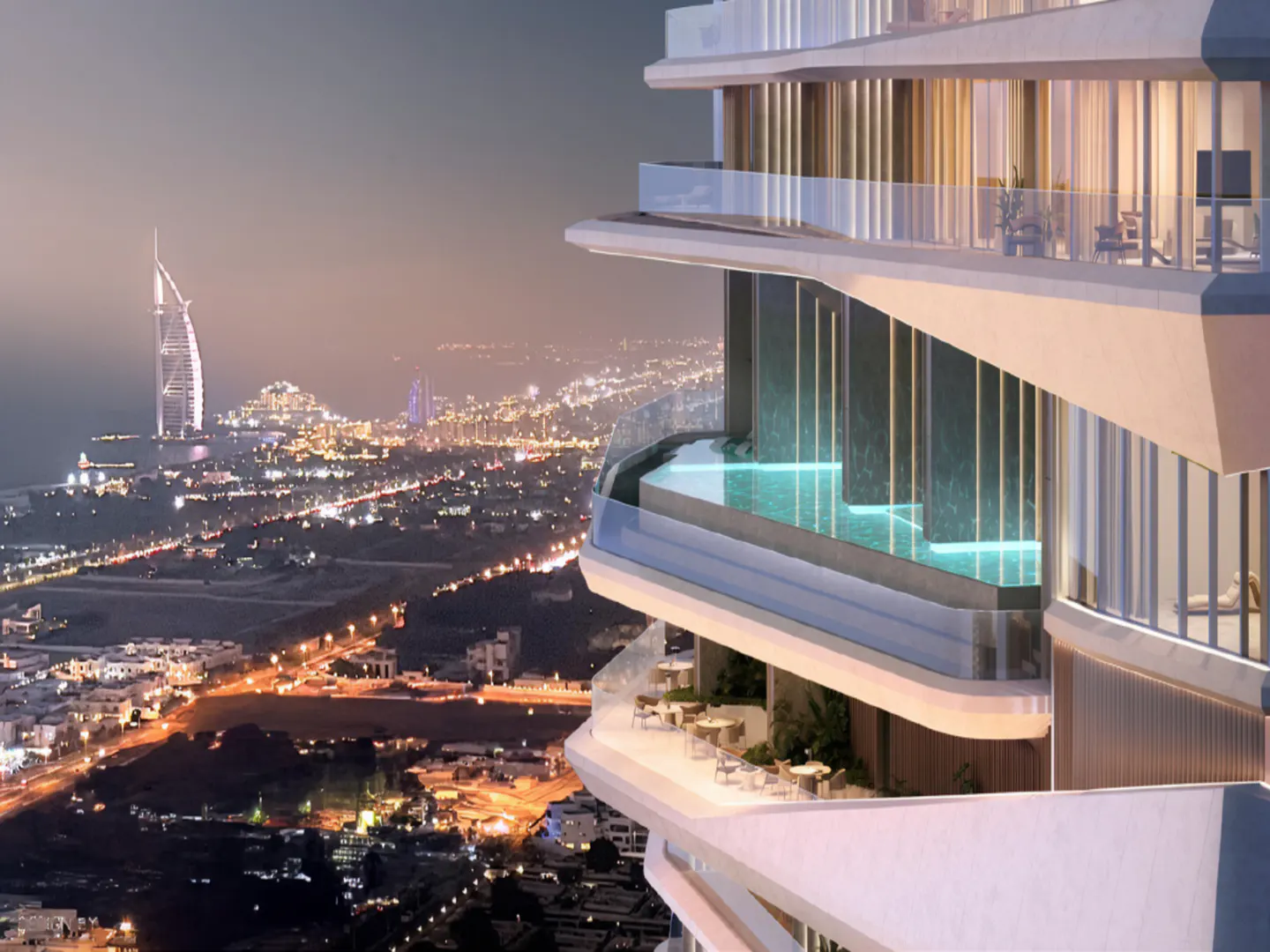 Close-up of a modern white high-rise with balconies, a pool, and city lights in the background at dusk.