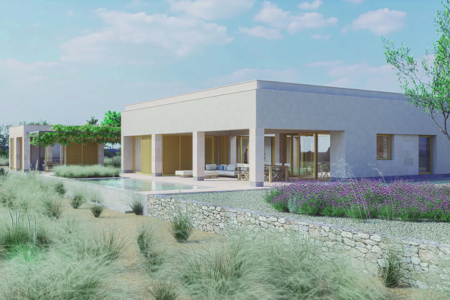 Modern white house with a pool and stone wall. Purple flowers and green grass in the foreground. Blue sky with clouds.