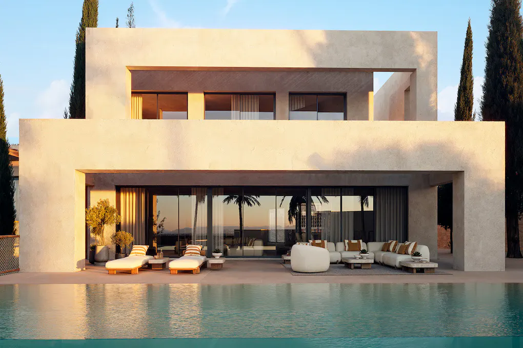 Modern two-story house with a pool. The exterior is light beige with large windows and sliding glass doors. Outdoor furniture includes lounge chairs and a white sofa.