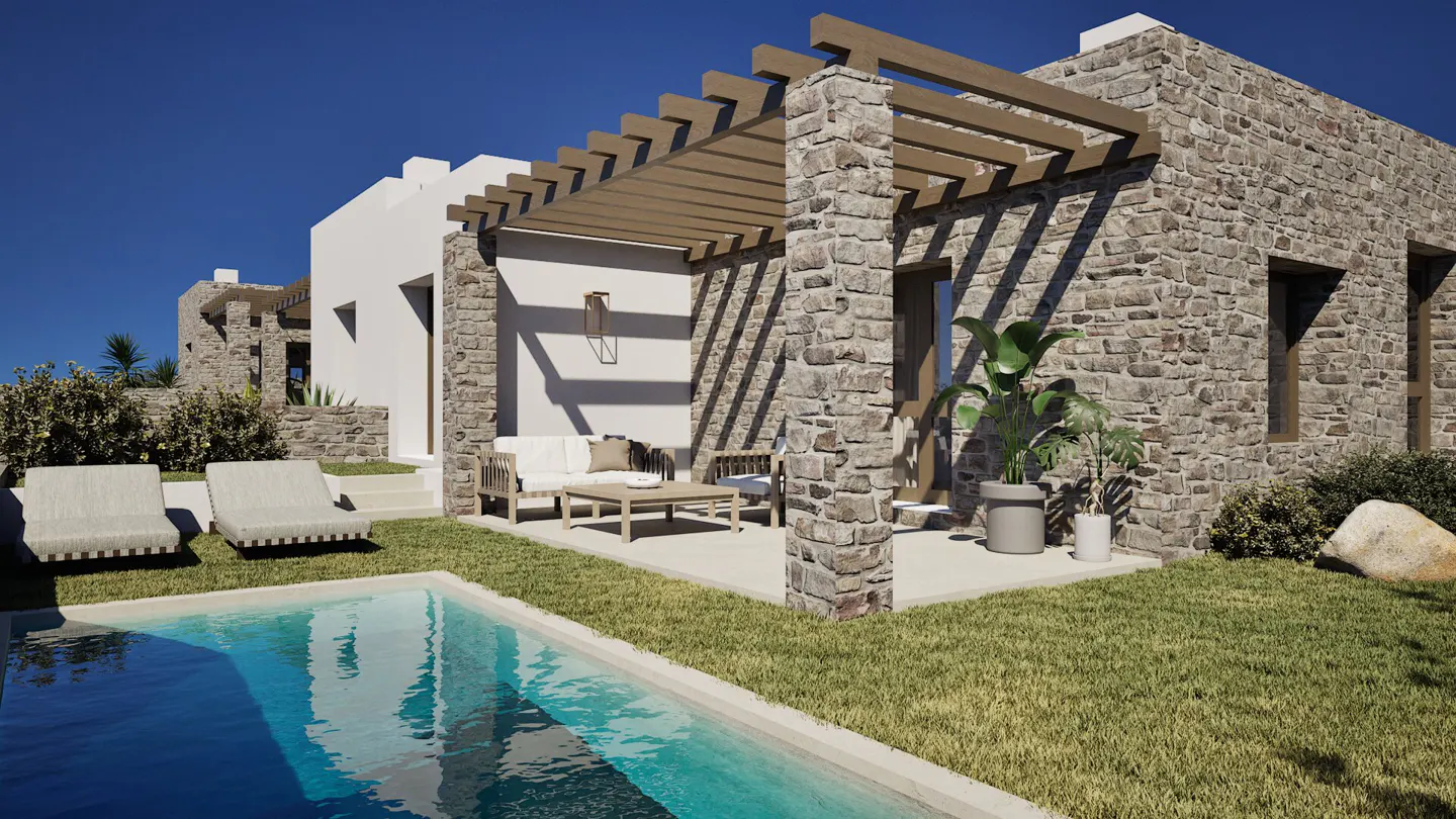 Exterior view of a stone and white villa with a pool, lounge chairs, and patio furniture under a pergola.