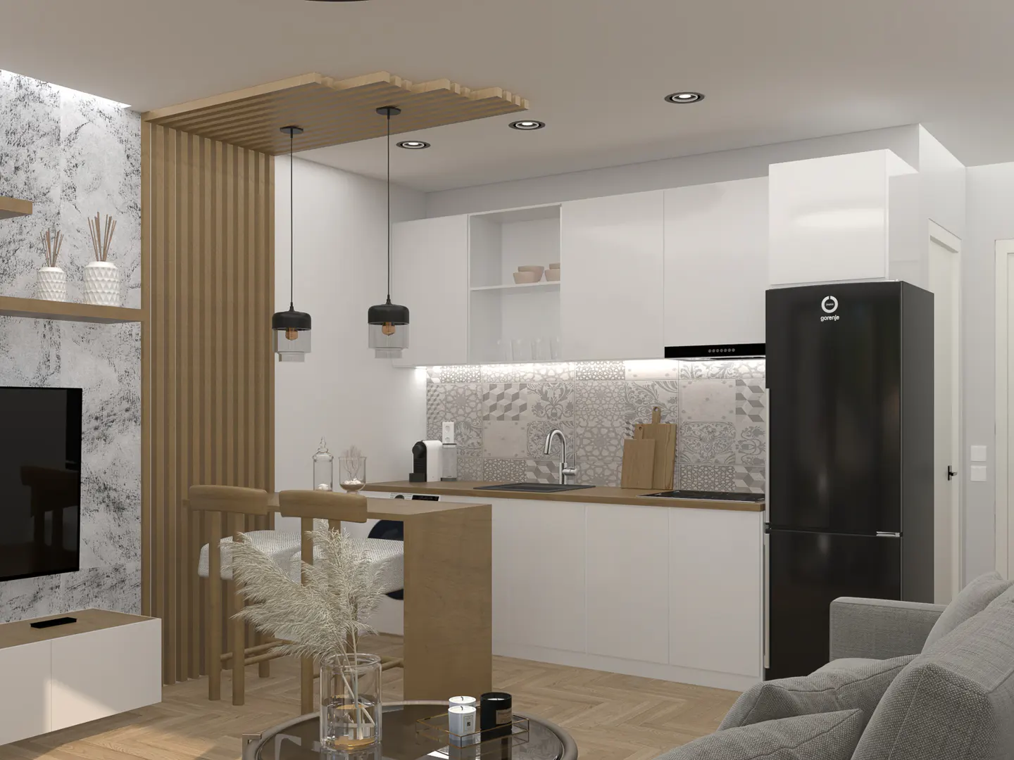 A modern kitchen and living room area with white cabinets, a black fridge, and wooden accents. Two pendant lights hang above a small breakfast bar.
